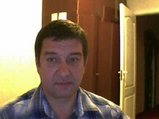 Олег Комаров