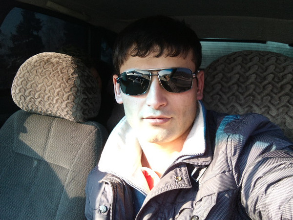Али Холматов