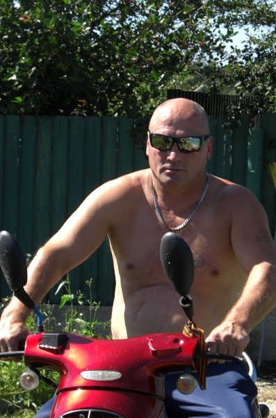 Олег Томилин