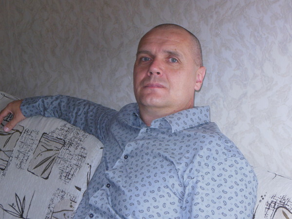 Андрей Романенко